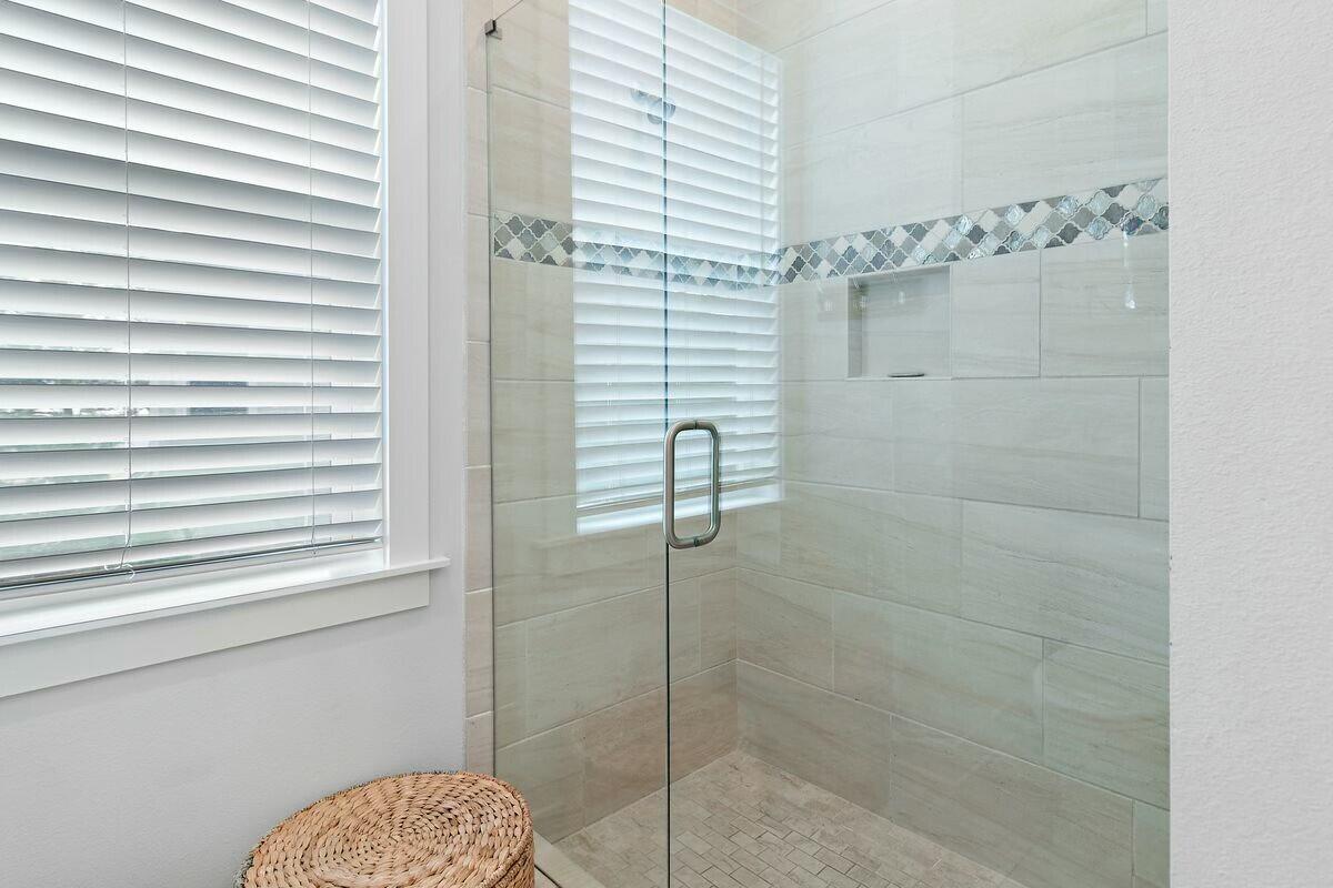 58 East Milestone Dr Inlet Beach, Unit B Inlet Beach, FL 32461 - Photo 21 of 47 a bathroom with a shower
