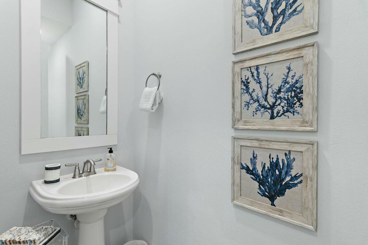 58 East Milestone Dr Inlet Beach, Unit B Inlet Beach, FL 32461 - Photo 27 of 47 a bathroom with a sink and a mirror