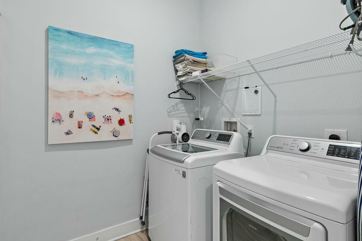 58 East Milestone Dr Inlet Beach, Unit B Inlet Beach, FL 32461 - Photo 28 of 47 a utility room with dryer and washer