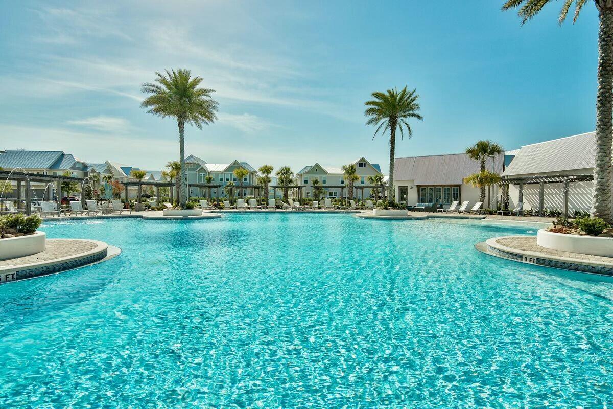 58 East Milestone Dr Inlet Beach, Unit B Inlet Beach, FL 32461 - Photo 38 of 47 a view of a swimming pool and front of house