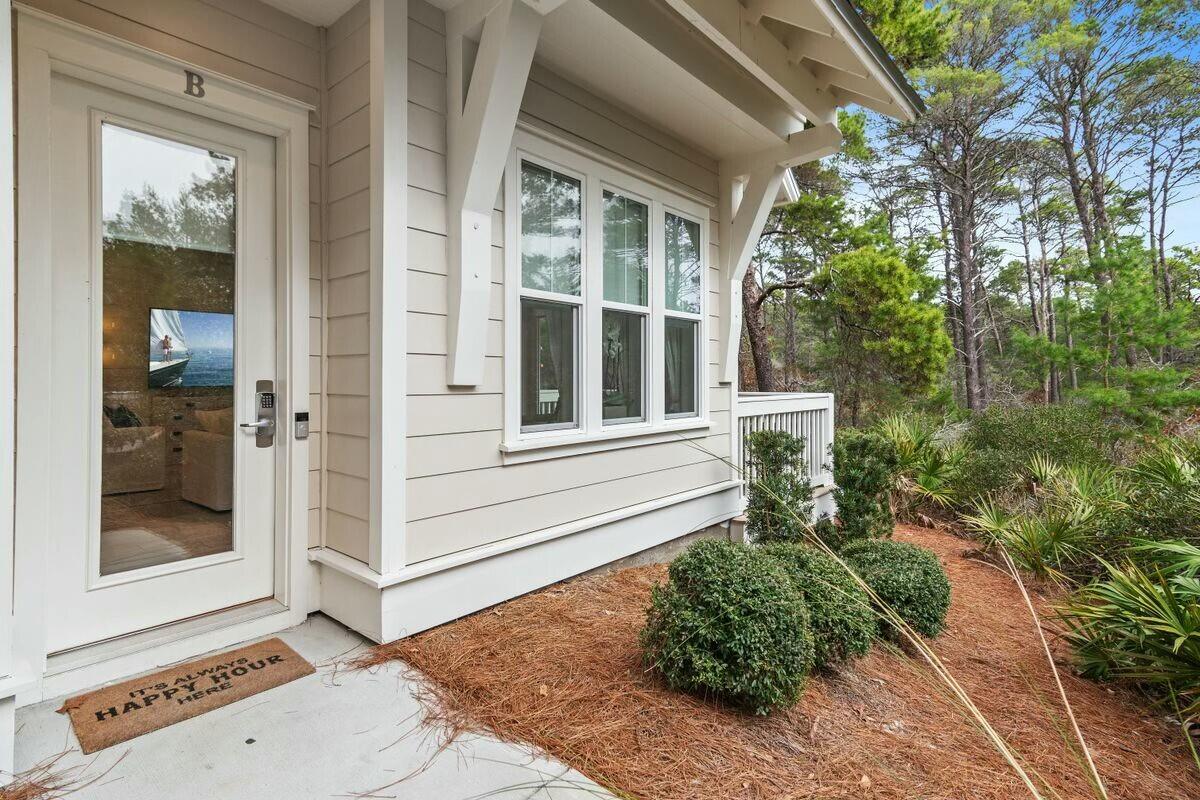 58 East Milestone Dr Inlet Beach, Unit B Inlet Beach, FL 32461 - Photo 4 of 47 a view of a door with a outdoor space