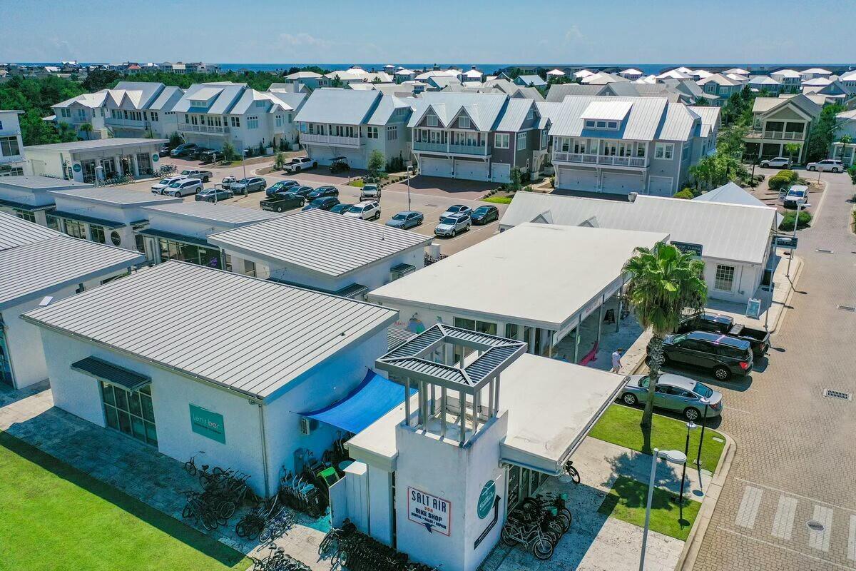 58 East Milestone Dr Inlet Beach, Unit B Inlet Beach, FL 32461 - Photo 44 of 47 an aerial view of a house with swimming pool and furniture