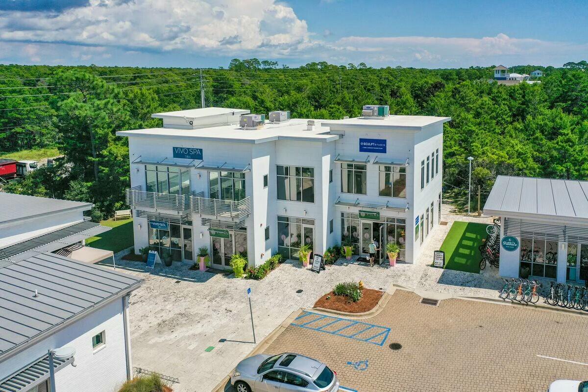 58 East Milestone Dr Inlet Beach, Unit B Inlet Beach, FL 32461 - Photo 45 of 47 a front view of a house with a yard