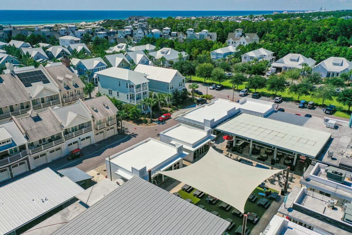 58 East Milestone Dr Inlet Beach, Unit B Inlet Beach, FL 32461 - Photo 47 of 47 an aerial view of a house with a yard