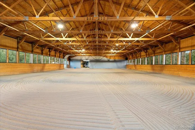 a living room with a couch and a fireplace