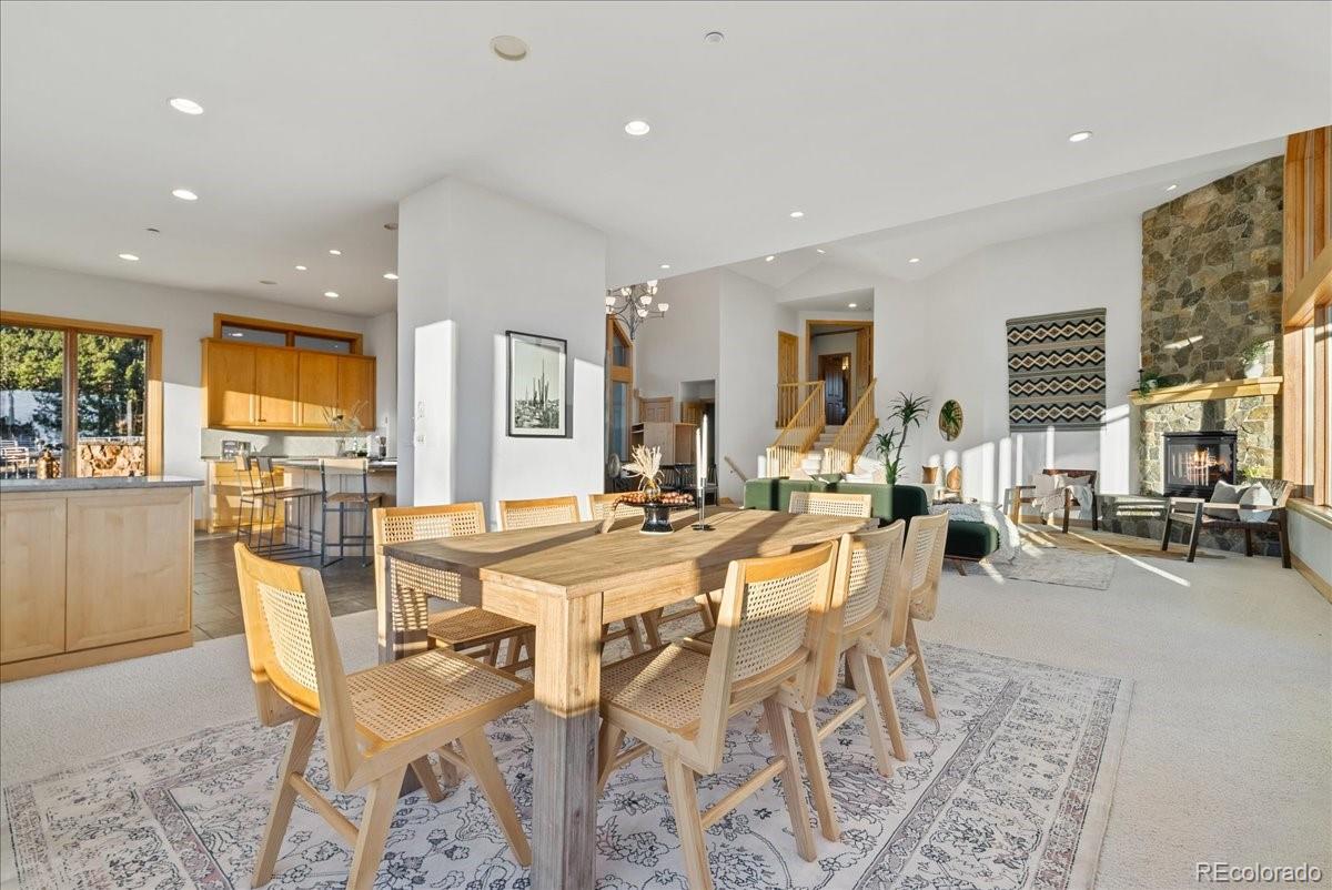 20682 Falcon Wing Road Indian Hills, CO 80454 - Photo 24 of 50 a view of a dining room with furniture