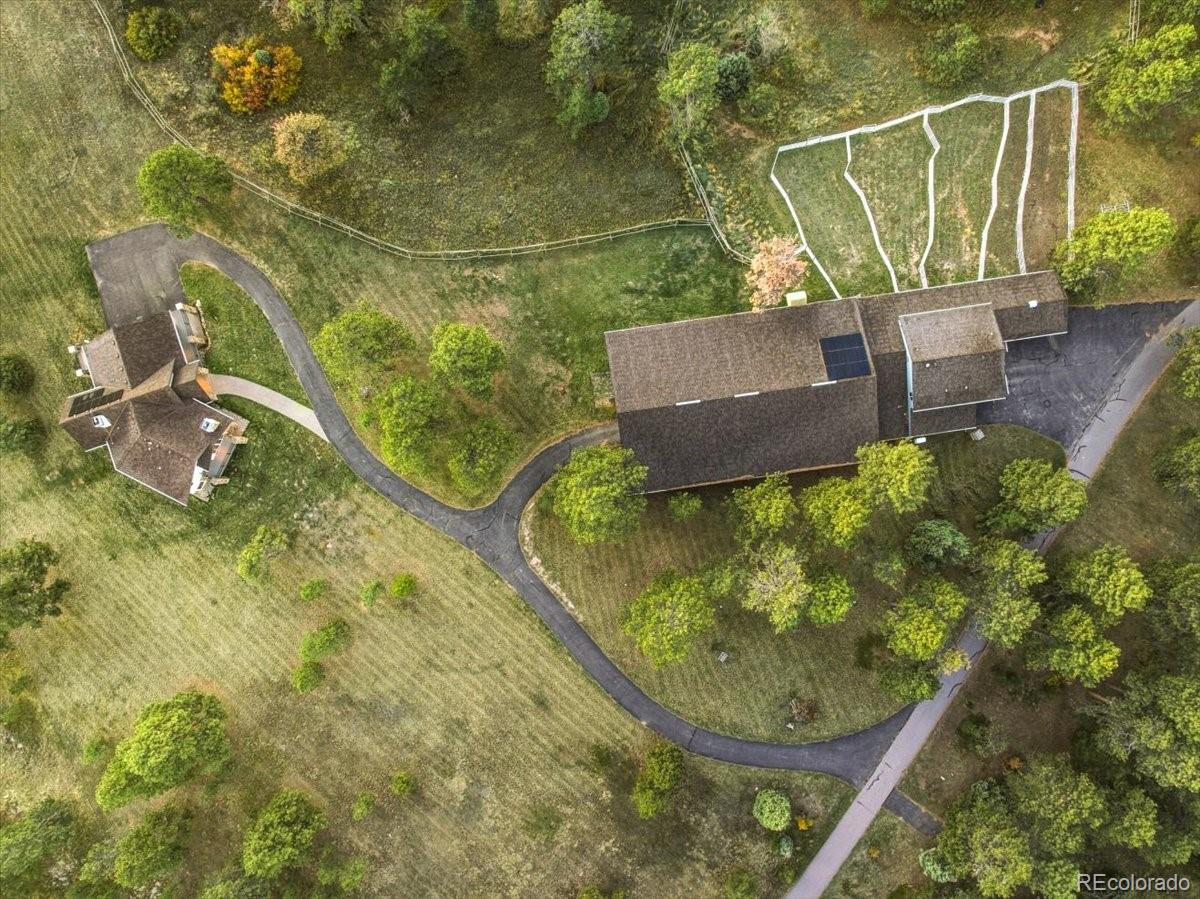 20682 Falcon Wing Road Indian Hills, CO 80454 - Photo 45 of 50 a view of a backyard