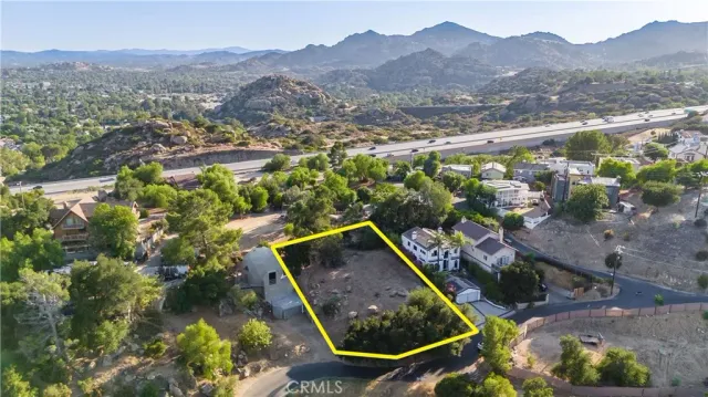 a view of a backyard with a lake view