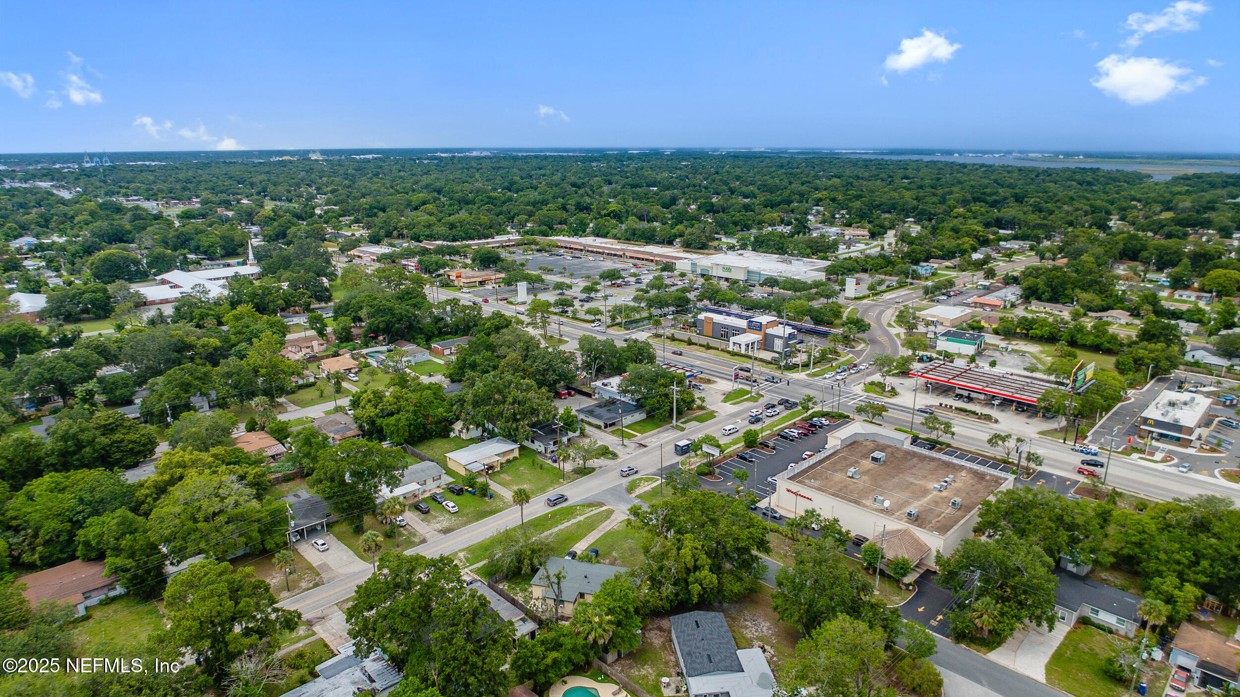 7120 Merrill Road Jacksonville, FL 32211 - Photo 44 of 60 an aerial view of residential houses with outdoor space and trees