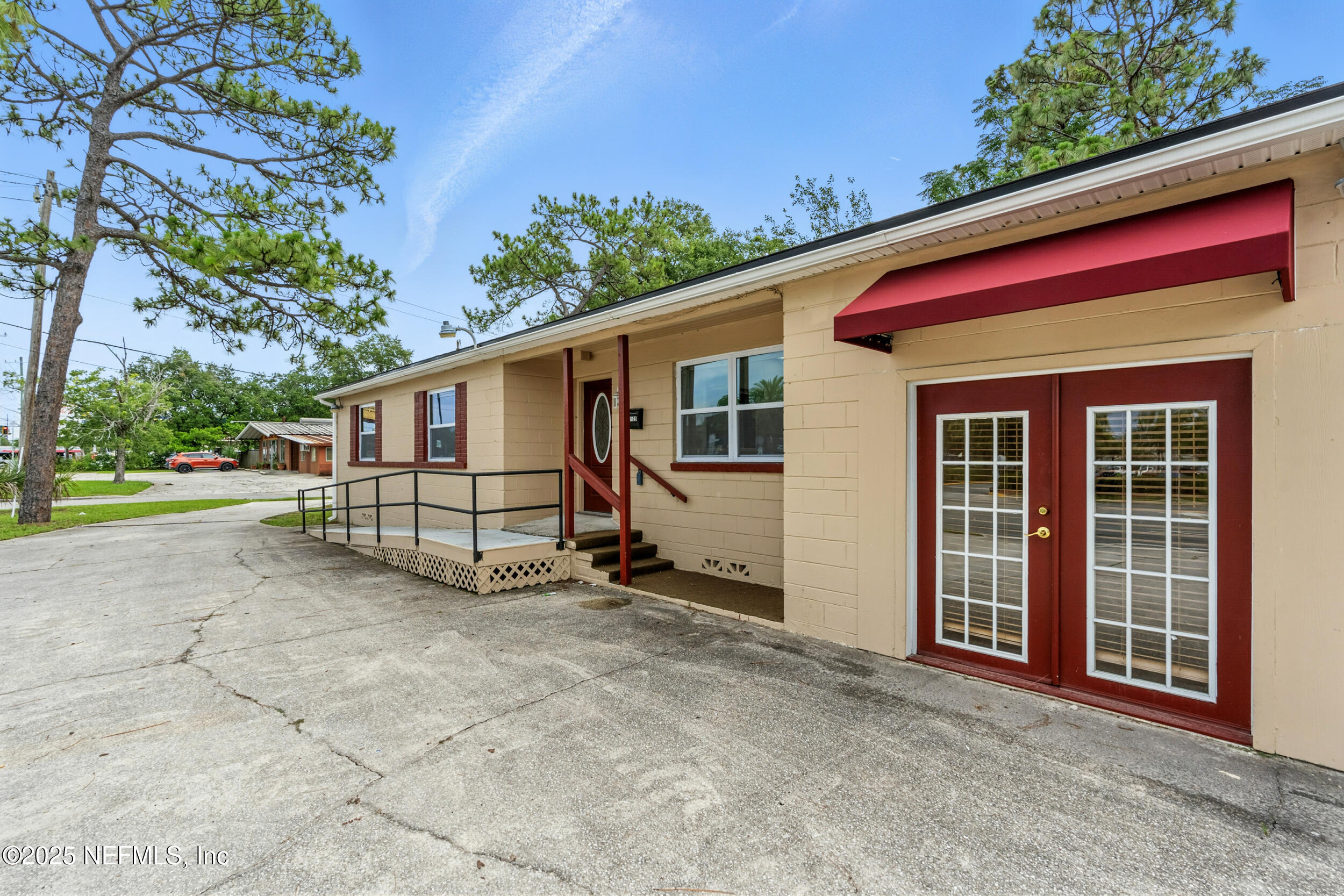 7120 Merrill Road Jacksonville, FL 32211 - Photo 8 of 60 a view of front of house with a yard