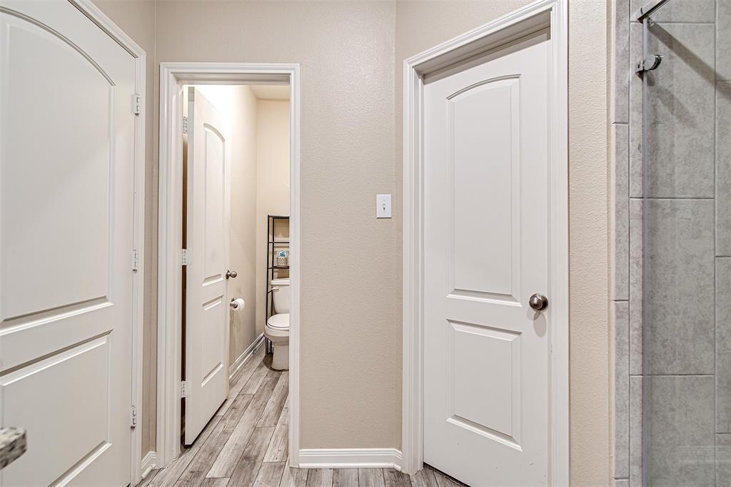 1813 Rialto Lane Crowley, TX 76036 - Photo 19 of 27 a view of a bathroom from the hallway