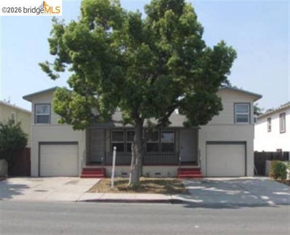 3954 Railroad Avenue, Unit 2 Pittsburg, CA 94565 - Photo 1 of 2 a view of street along with house and trees