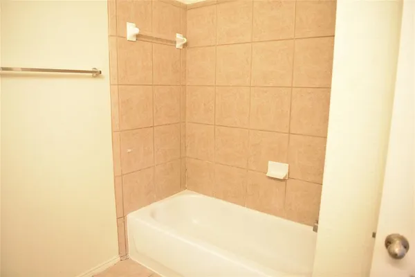 a bathroom with a bathtub