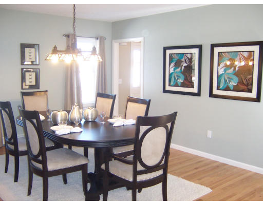Lot 101 Lot Drive Rochester, MA 02770 - Photo 4 of 5 a view of a dining room with furniture and wooden floor