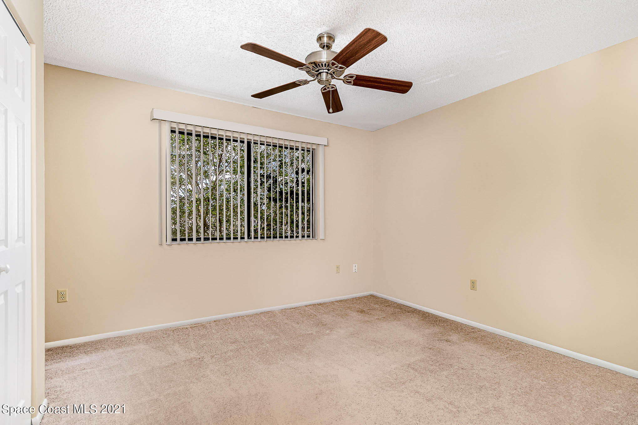 4715 Sisson Road Titusville, FL 32780 - Photo 14 of 19 Front Guest Bedroom
