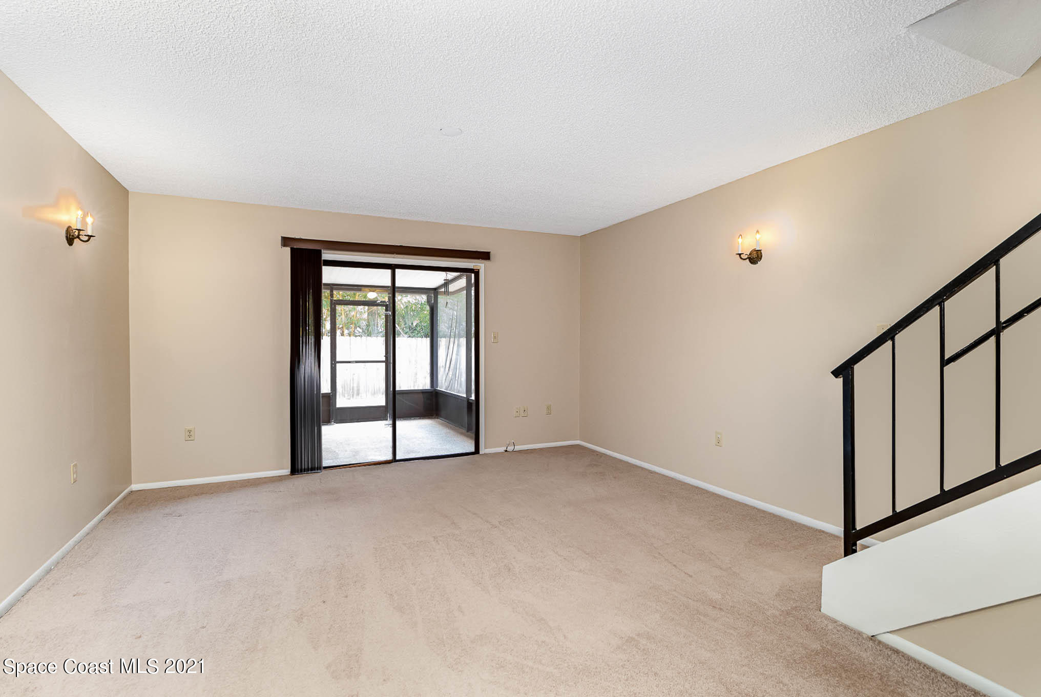 4715 Sisson Road Titusville, FL 32780 - Photo 3 of 19 Living Room to Patio