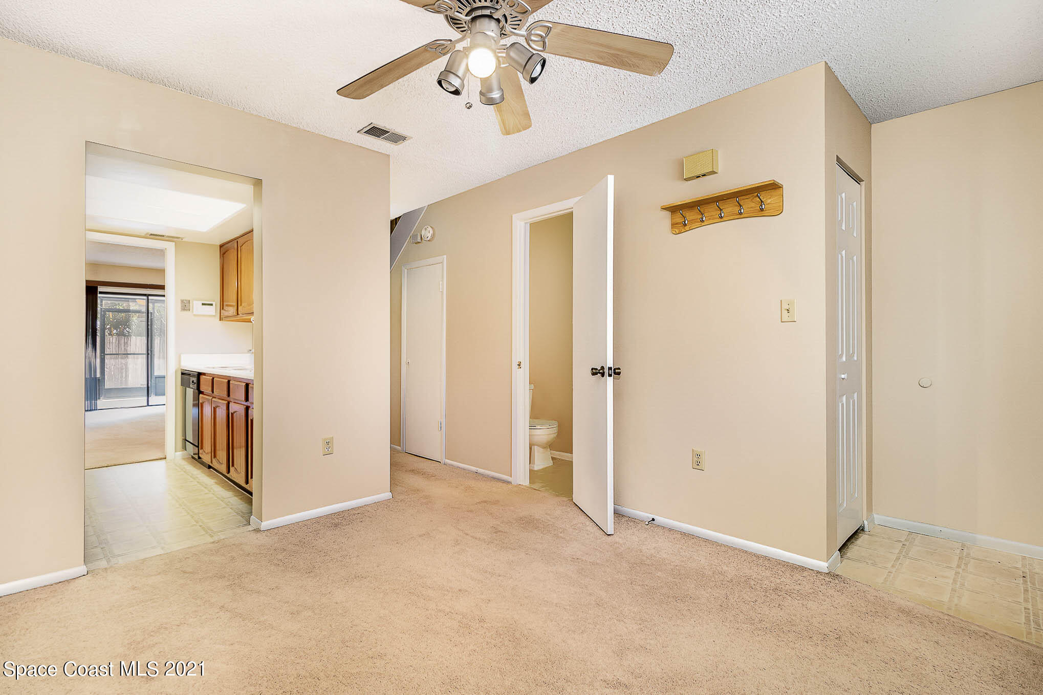 4715 Sisson Road Titusville, FL 32780 - Photo 8 of 19 Door to Downstairs Half Bath