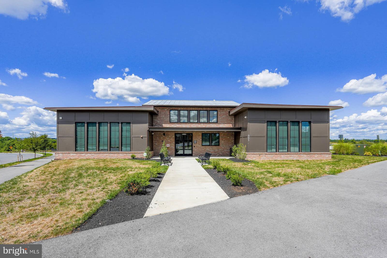 869 Amity Street Frederick, MD 21701 - Photo 41 of 48 a front view of a house with garden