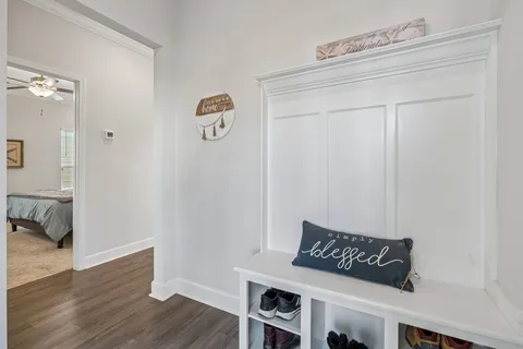 a view of a livingroom with wooden floor