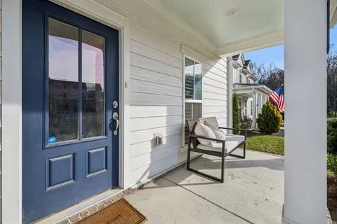a view of a bench in the porch
