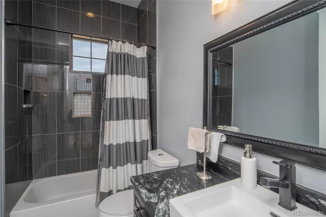 a bathroom with a sink and a shower