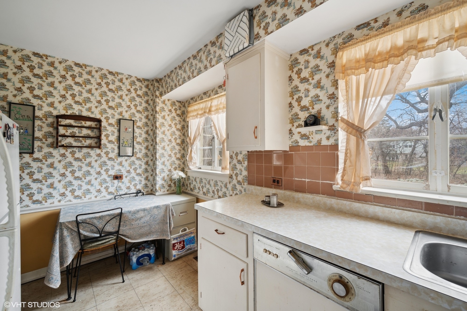 1628 South Meacham Road Rolling Meadows, IL 60008 - Photo 12 of 27 a living room with furniture and a window