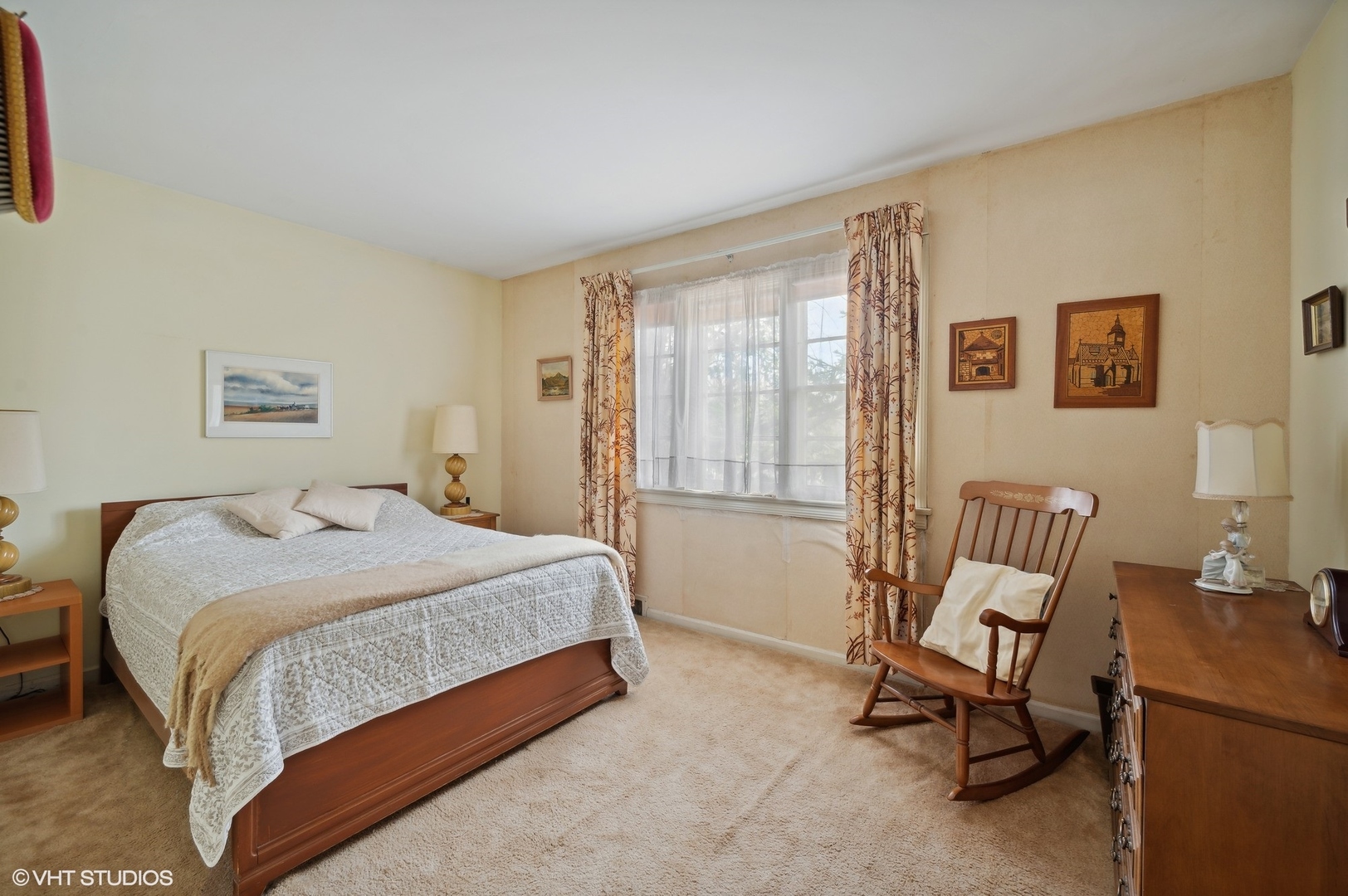 1628 South Meacham Road Rolling Meadows, IL 60008 - Photo 13 of 27 a bedroom with a bed chair and painting on the wall