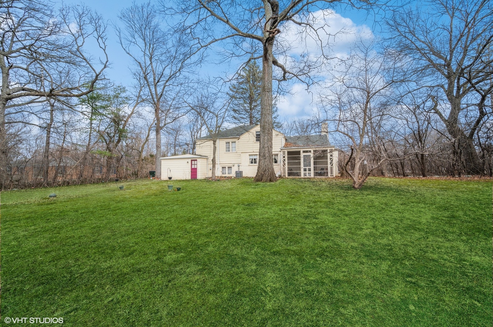 1628 South Meacham Road Rolling Meadows, IL 60008 - Photo 20 of 27 a view of a white house that has a big yard