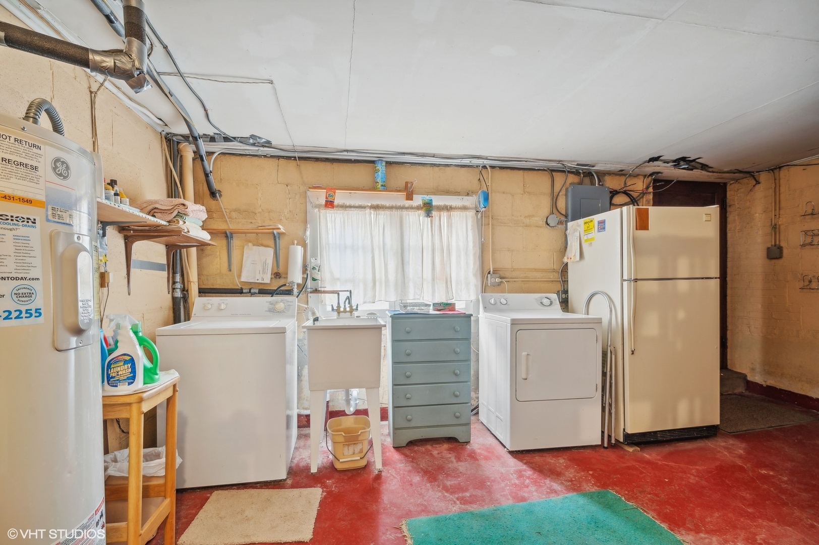 1628 South Meacham Road Rolling Meadows, IL 60008 - Photo 26 of 27 a kitchen with refrigerator and cabinets