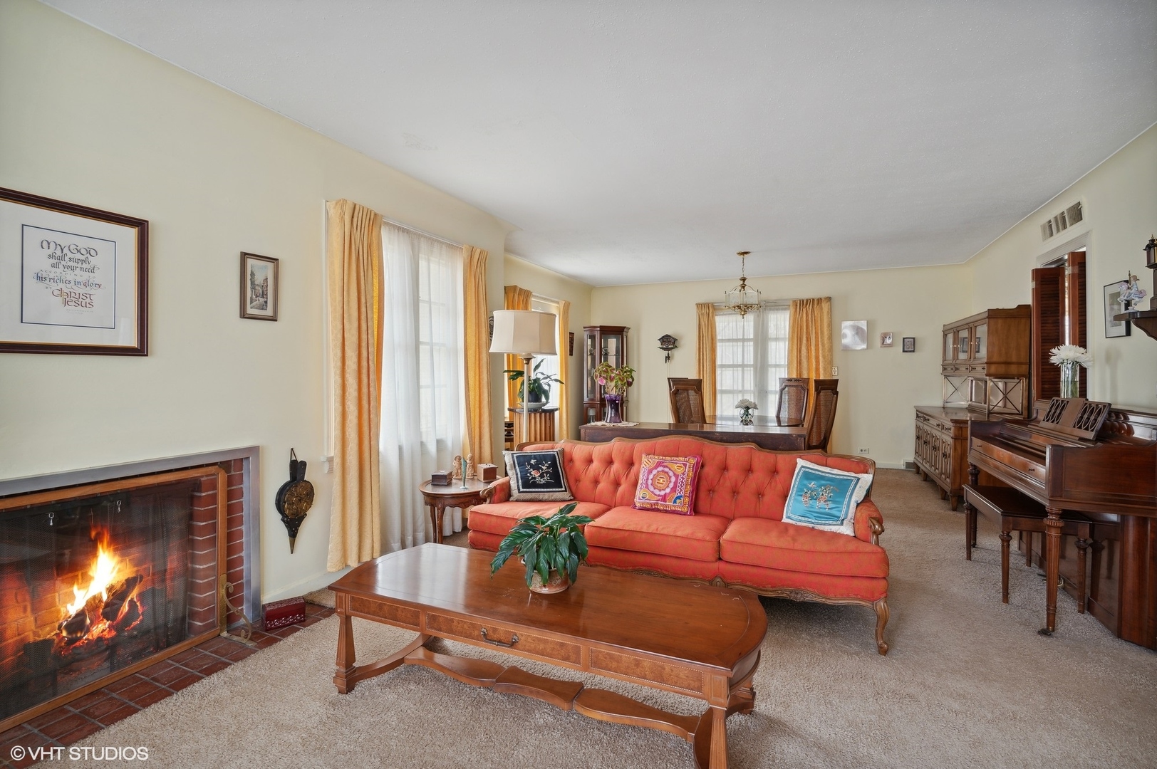 1628 South Meacham Road Rolling Meadows, IL 60008 - Photo 7 of 27 a living room with furniture a flat screen tv and a fireplace