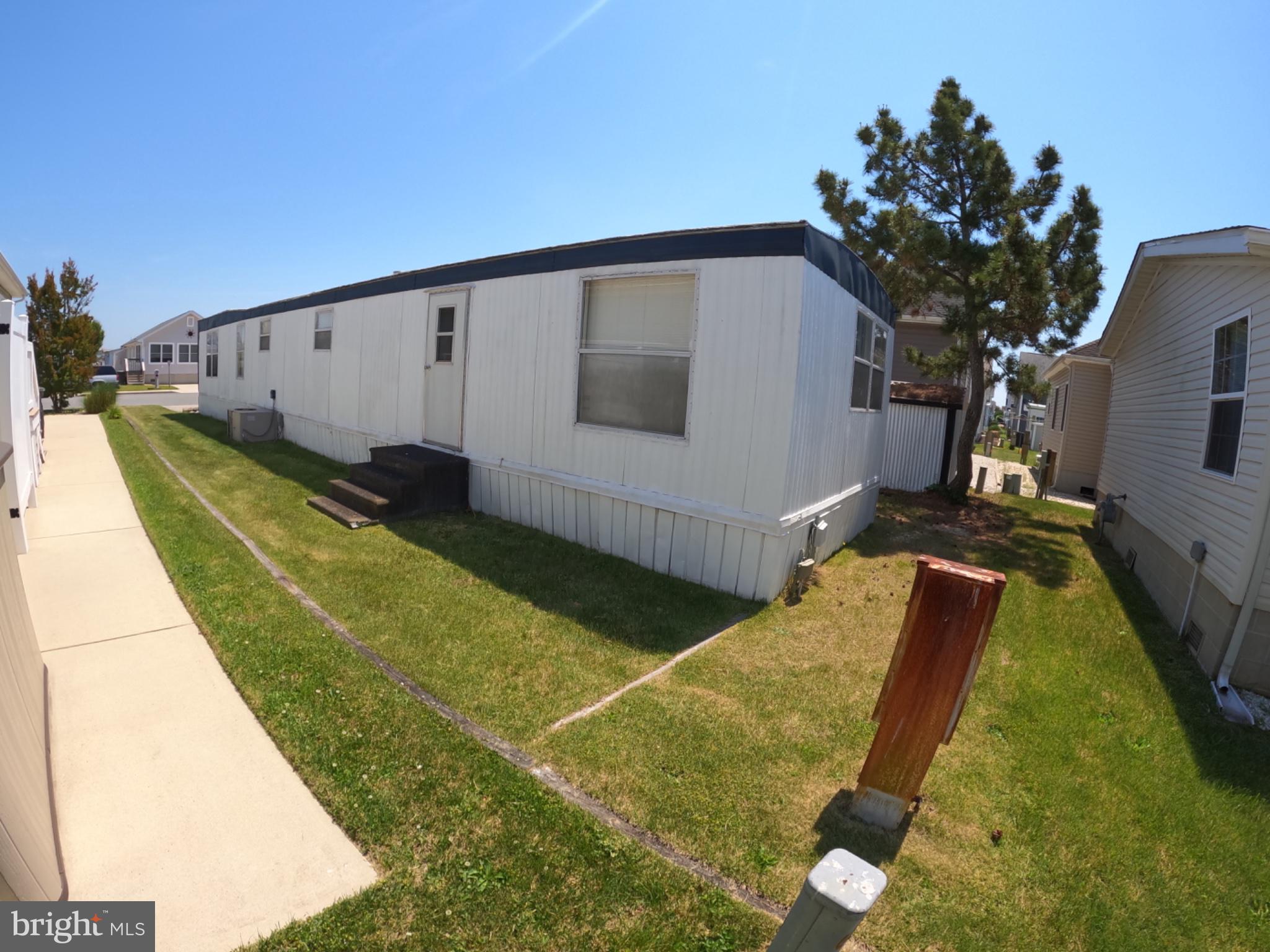 163 Clamshell Road Ocean City, MD 21842 - Photo 16 of 18 a view of a backyard
