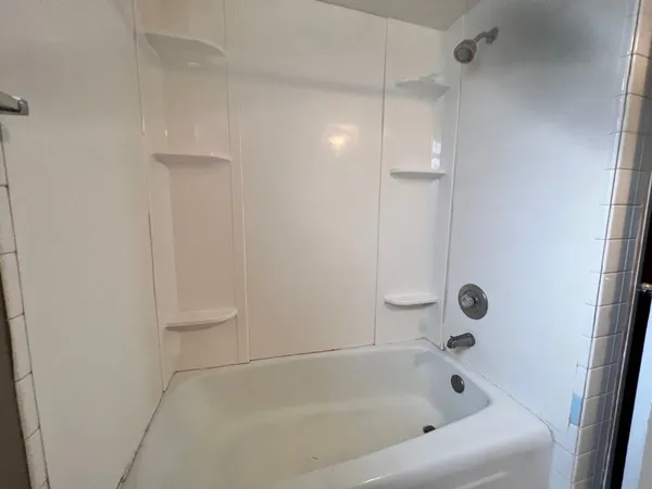 a bathroom with a bathtub