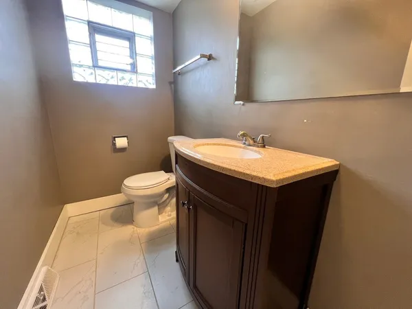 a bathroom with a sink and a toilet