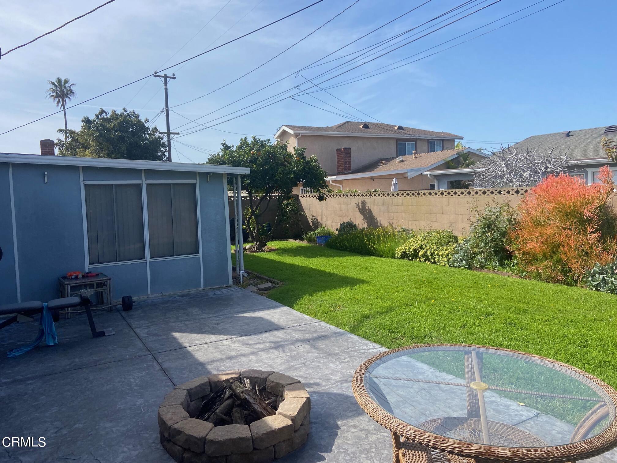 3611 South E Street Oxnard, CA 93033 - Photo 14 of 14 a view of a backyard with plants and a patio