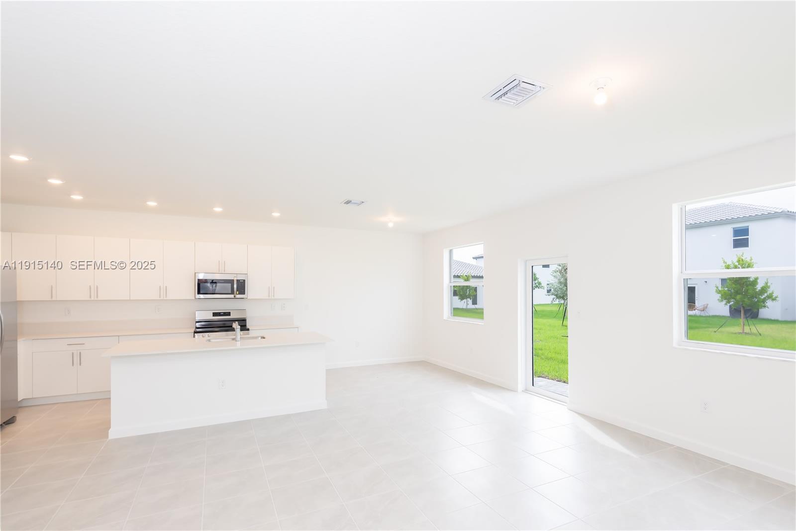 2636 Southeast 8th Court Homestead, FL 33035 - Photo 14 of 49 a view of a kitchen with a sink