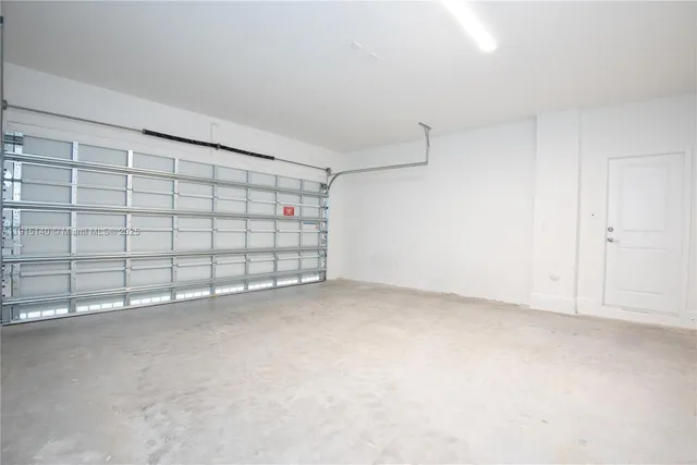a living room with fireplace furniture and a table