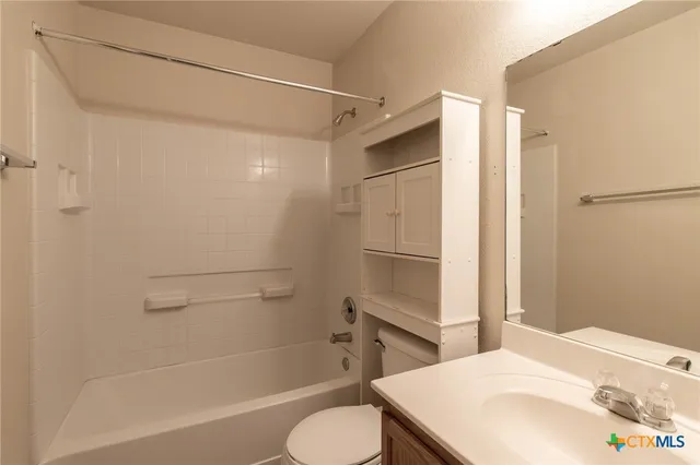 a house view with a backyard space