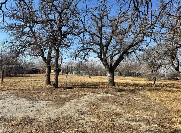 a view of an outdoor space and covered with trees