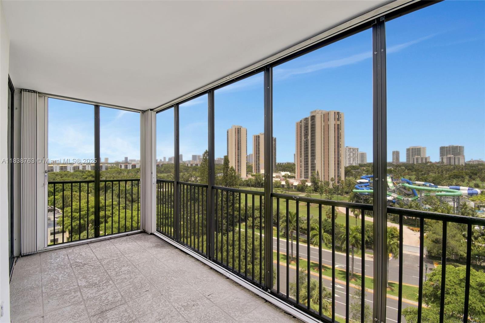 20100 West Country Club Drive, Unit 1005 Aventura, FL 33180 - Photo 27 of 36 a view of a city from a balcony