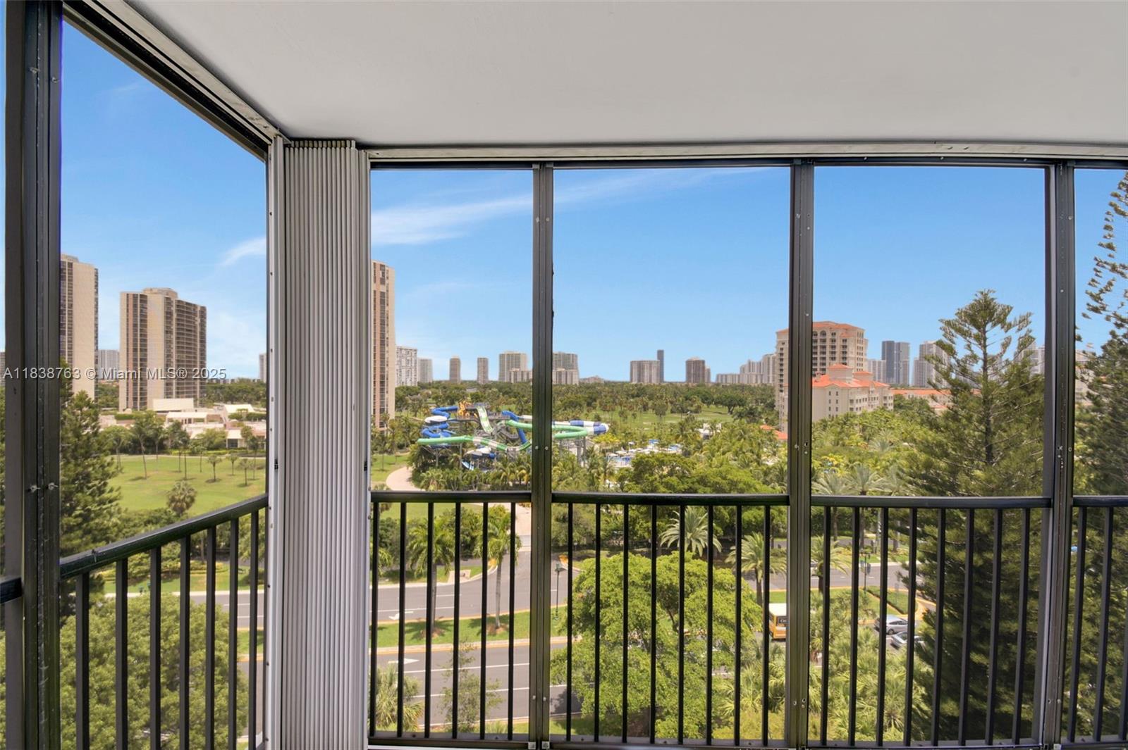 20100 West Country Club Drive, Unit 1005 Aventura, FL 33180 - Photo 29 of 36 a view of a city from a balcony