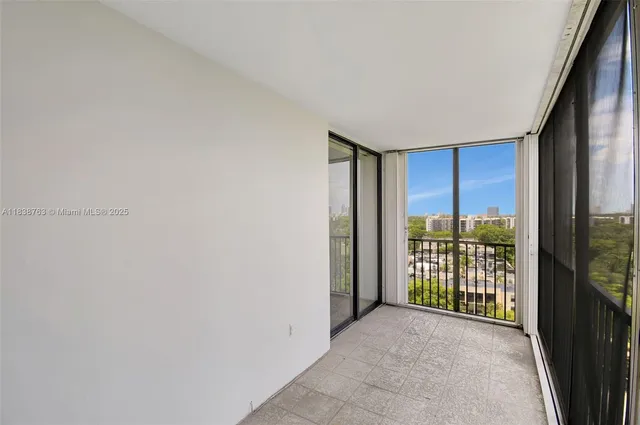 a view of a room with a large window