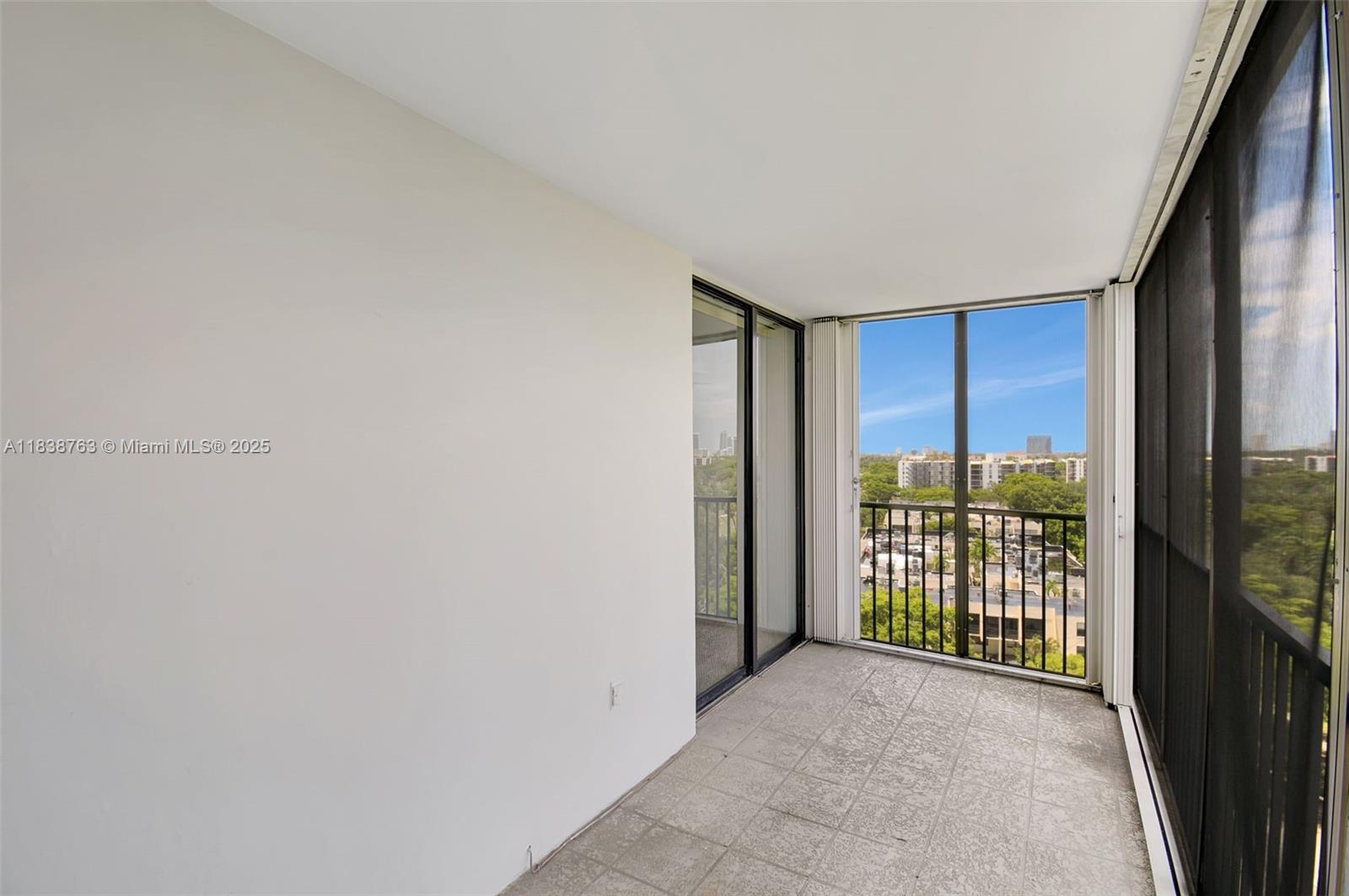 20100 West Country Club Drive, Unit 1005 Aventura, FL 33180 - Photo 30 of 36 a view of a room with a large window