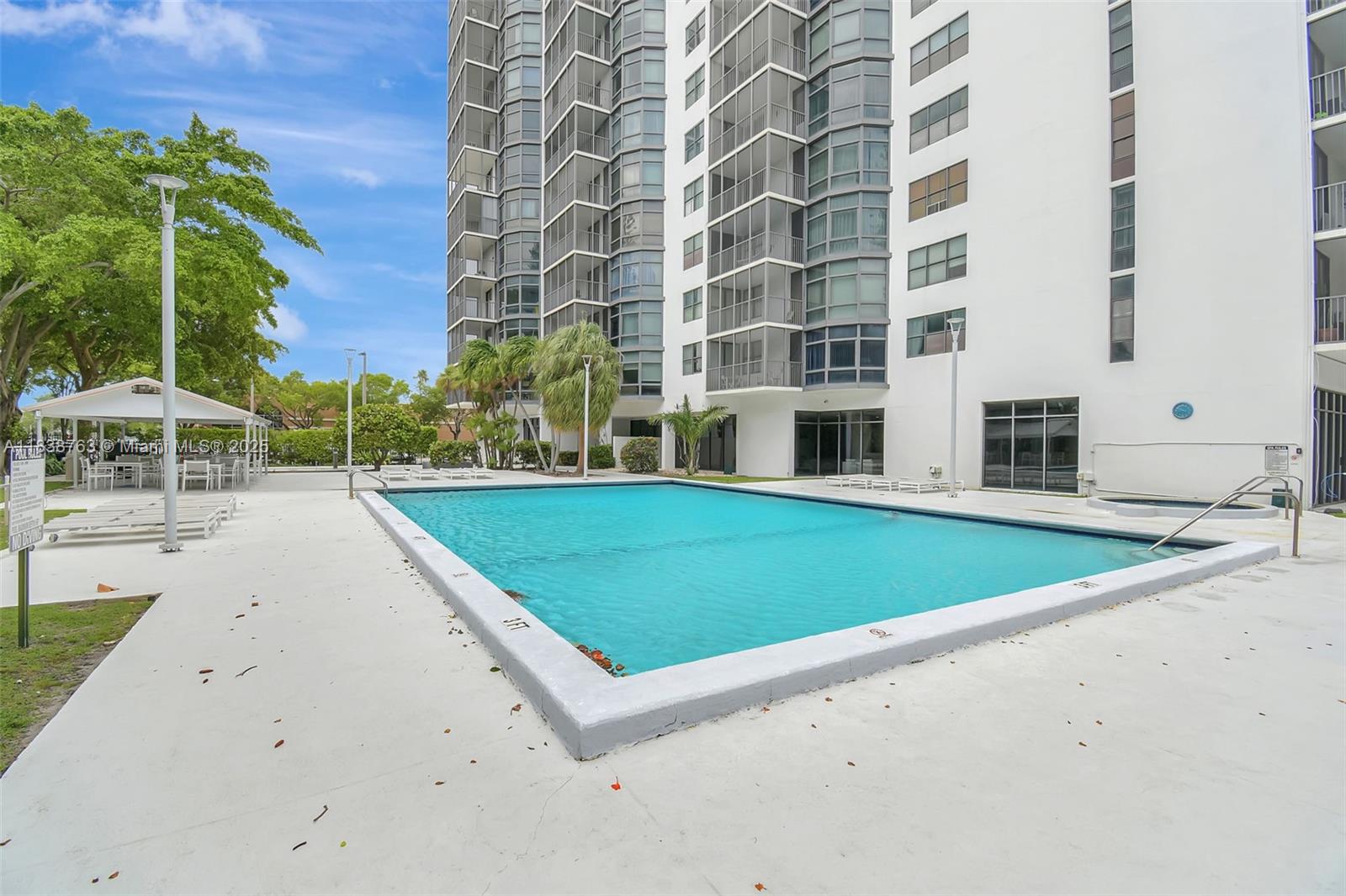 20100 West Country Club Drive, Unit 1005 Aventura, FL 33180 - Photo 32 of 36 an outdoor space with pool