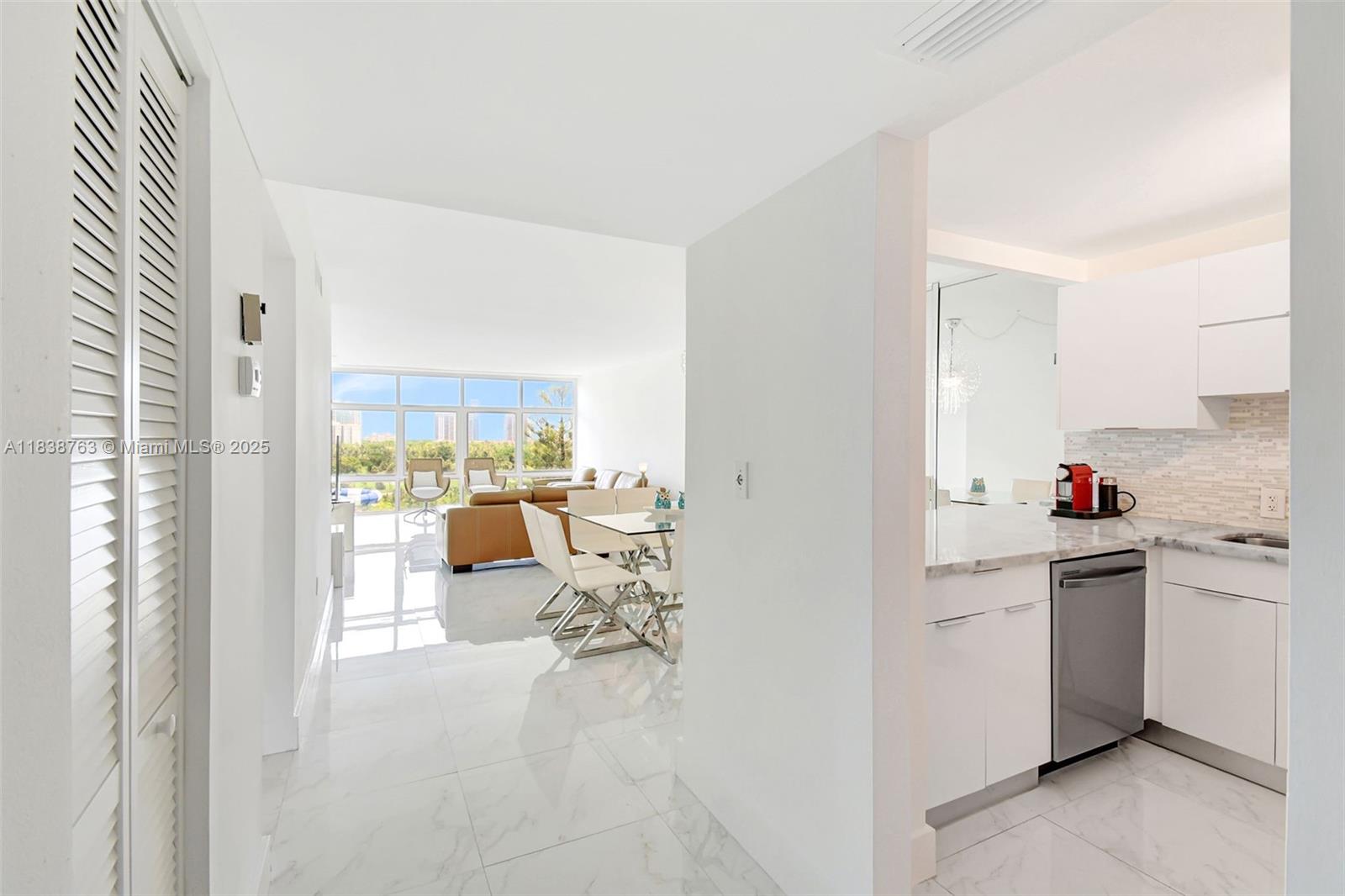 20100 West Country Club Drive, Unit 1005 Aventura, FL 33180 - Photo 9 of 36 a very nice looking room with a large window