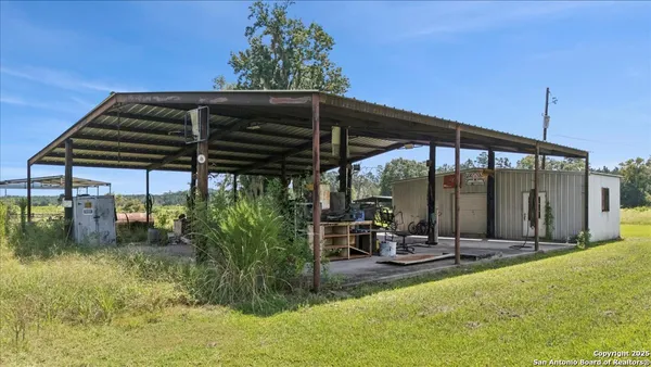 a view of swimming pool with patio