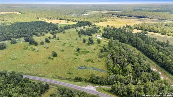a view of an ocean and a mountain