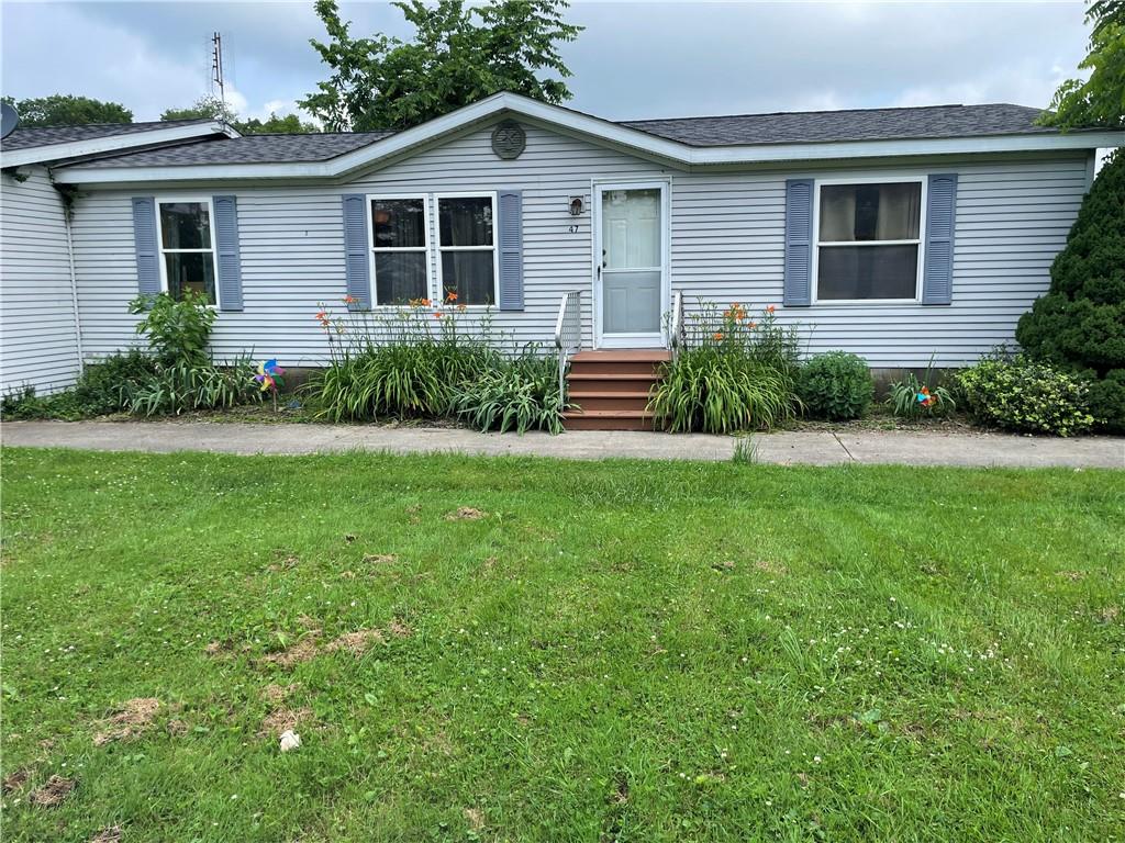 45-47 Ray Road Greenville, PA 16125 - Photo 1 of 15 a front view of a house with a yard and garage