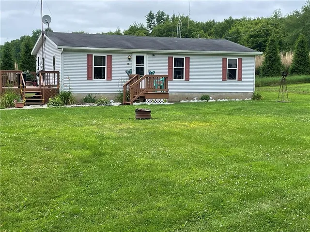 a house view with a garden space