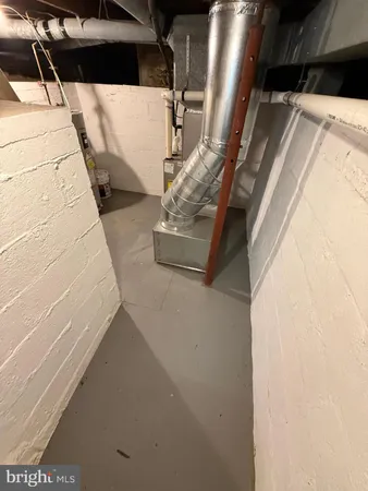 a view of a road with a building in the background