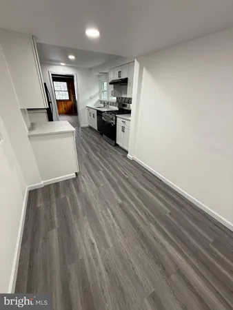 a view of a kitchen with microwave and stove